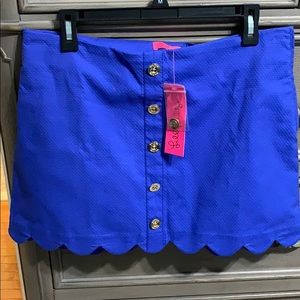 Iris Blue skort with buttons down the front